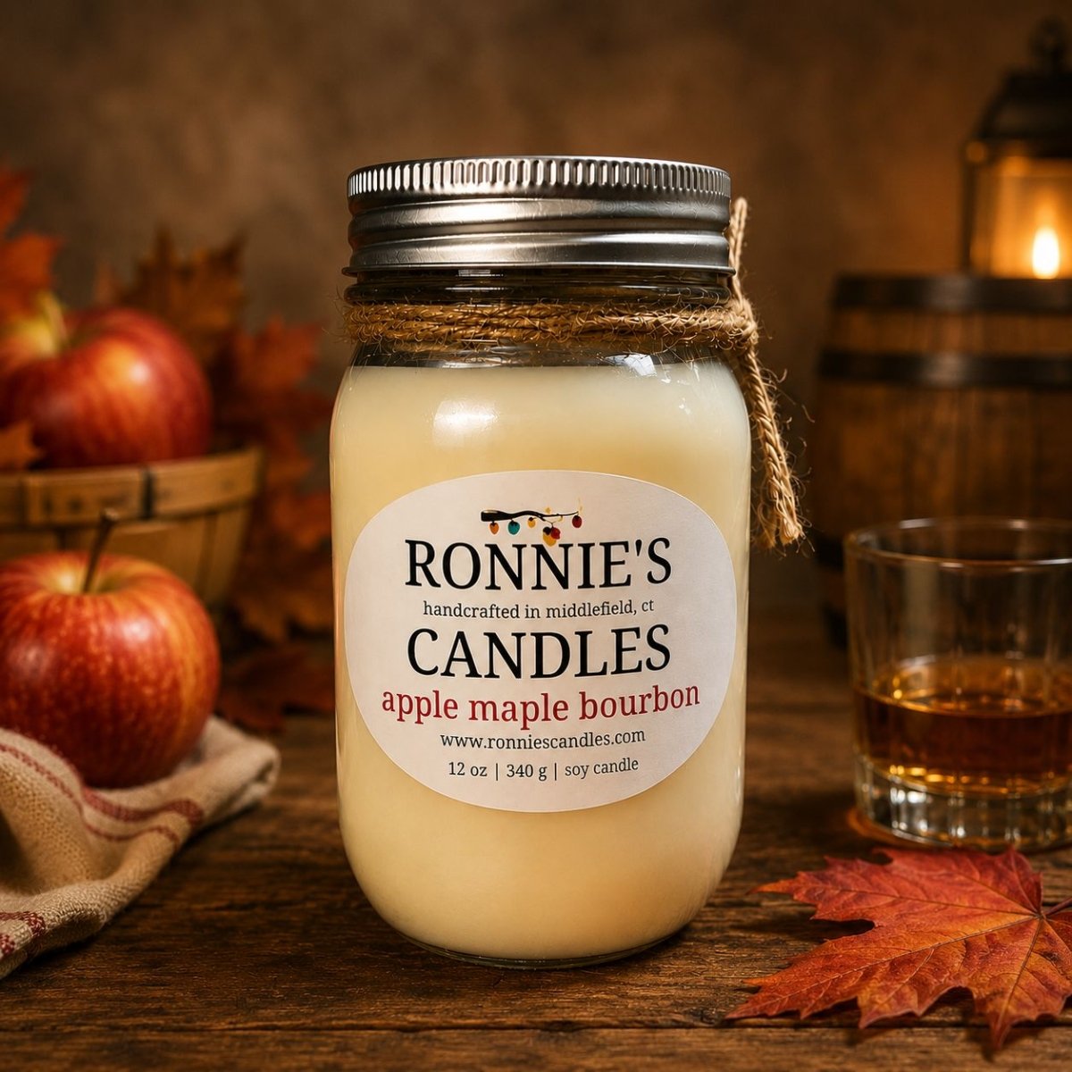 Hand crafted soy candle in a mason jar with apple and maple scents for a autumn aromatic experience.