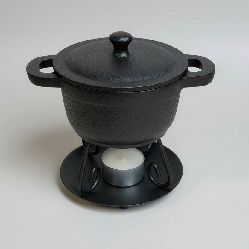 Cast iron Dutch oven used as a wax warmer for efficient and stylish home fragrance solutions