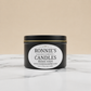 Dozen roses with soy candle emitting strong floral fragrance for elegant home ambiance