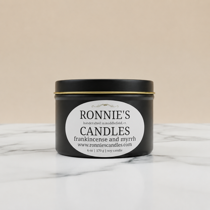 Frankincense and Myrrh soy candle emitting a soothing scent for relaxation and ambiance