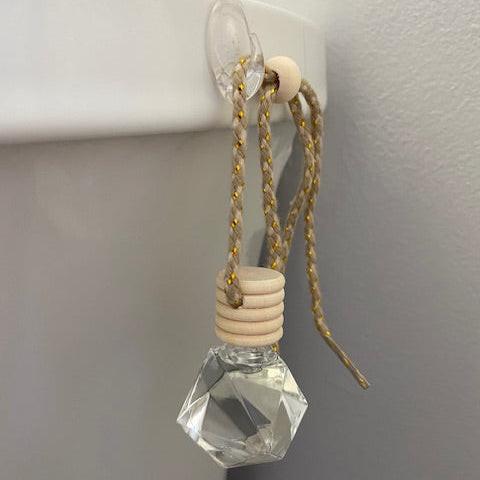 Toilet tank charms fragrance dispenser designed to freshen bathrooms with long-lasting scent and elegant appeal