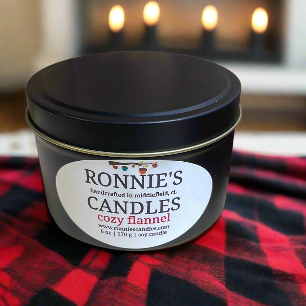 Cozy flannel soy candle with clean scent, perfect for a warm and inviting home atmosphere