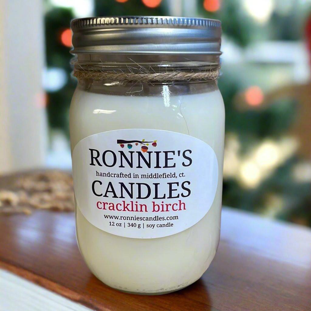Cracklin' Birch soy candle emitting earthy and smokey aromas, perfect for a cozy ambiance