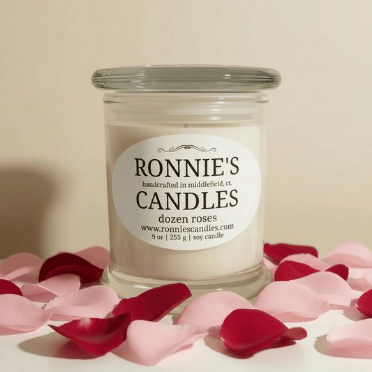 Dozen roses with soy candle emitting strong floral fragrance for elegant home ambiance