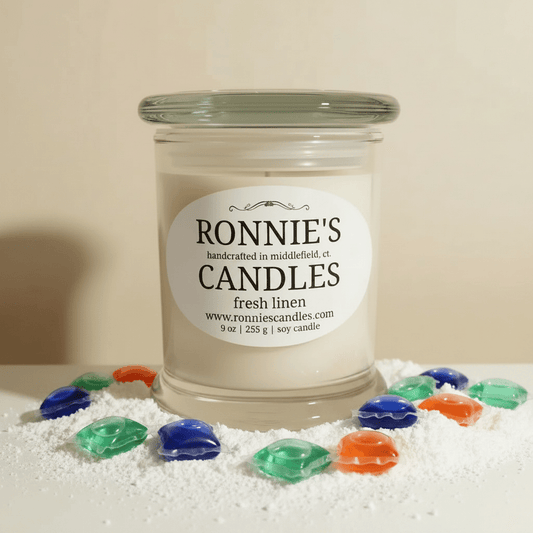 Fresh linen scented soy candle creating a cozy and natural ambiance in your home