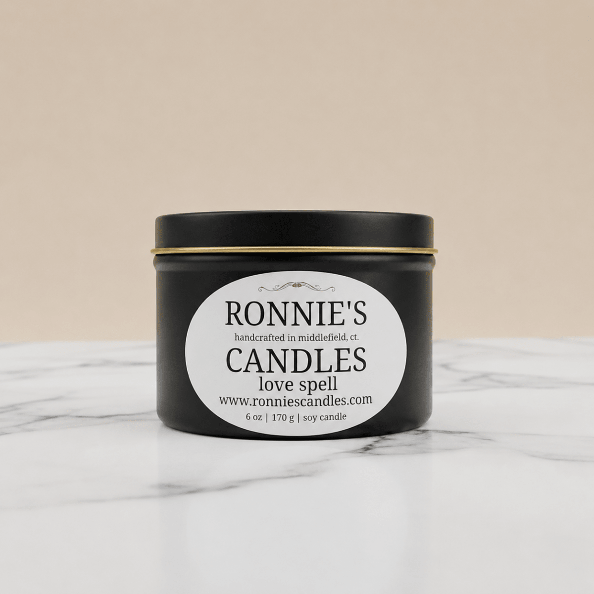 Love Spell soy candle offering a romantic ambiance with natural, aromatic ingredients for an enchanting experience.