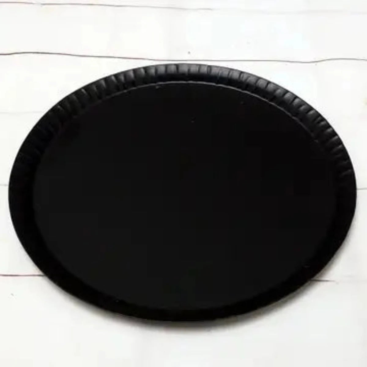 Metal candle coaster designed for added safety and protection of surfaces