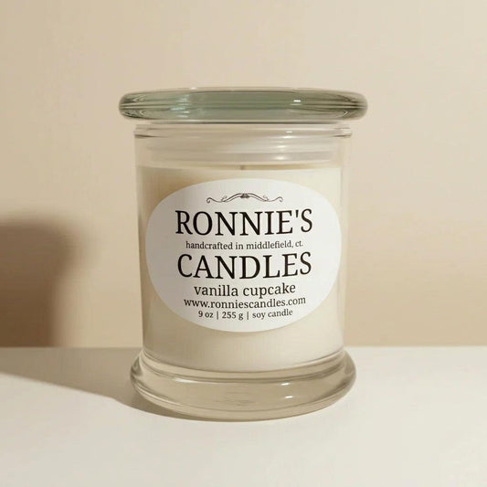 Soy wax candle emitting a classic scent of vanilla cupcake, perfect for soothing ambiance and aromatic delight.