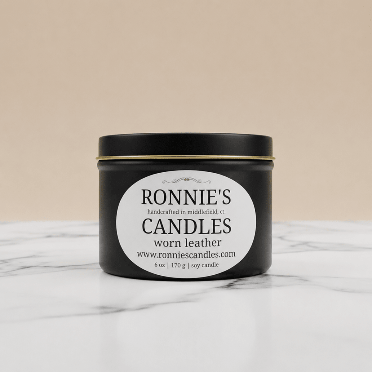 Worn leather soy candle with earthy scents, perfect leather scented candle for cozy ambiance