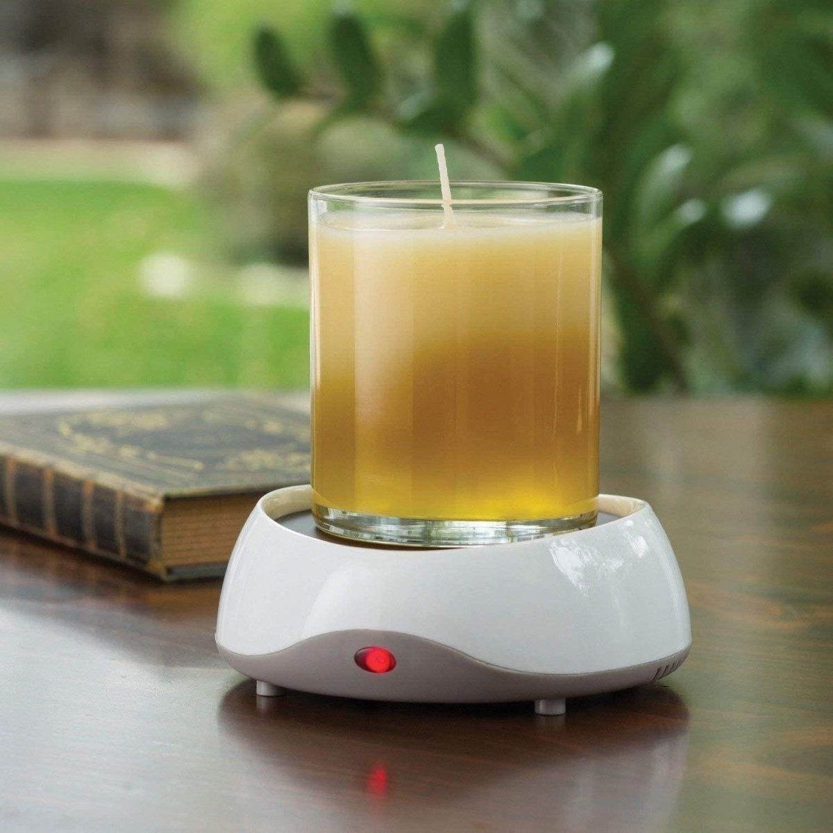 Elegant candle warmer enhancing ambiance while safely melting scented candles for a soothing aromatic experience.