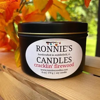 Luxurious soy candle emitting a rich smokey aroma, perfect for an elegant and cozy ambiance firewood