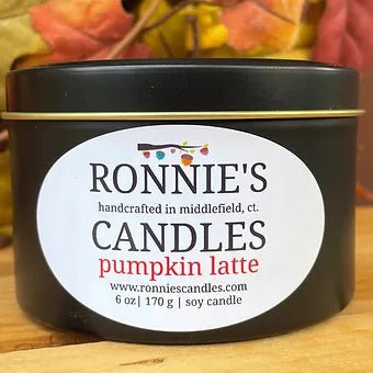Cozy autumn candle with pumpkin latte scent, perfect for fall vibes and warm, inviting home fragrance